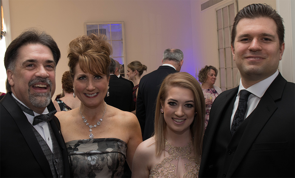 2018-GalaPreReception-Event (45) | Springbrook John and Jeanette Bryans, their daughter Amelia, and guest at the 2018 Springbrook Gala
