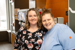 Casia at McDonalds with her manager John | Springbrook Employment coach Erin Branigan (right) and Casia (left)